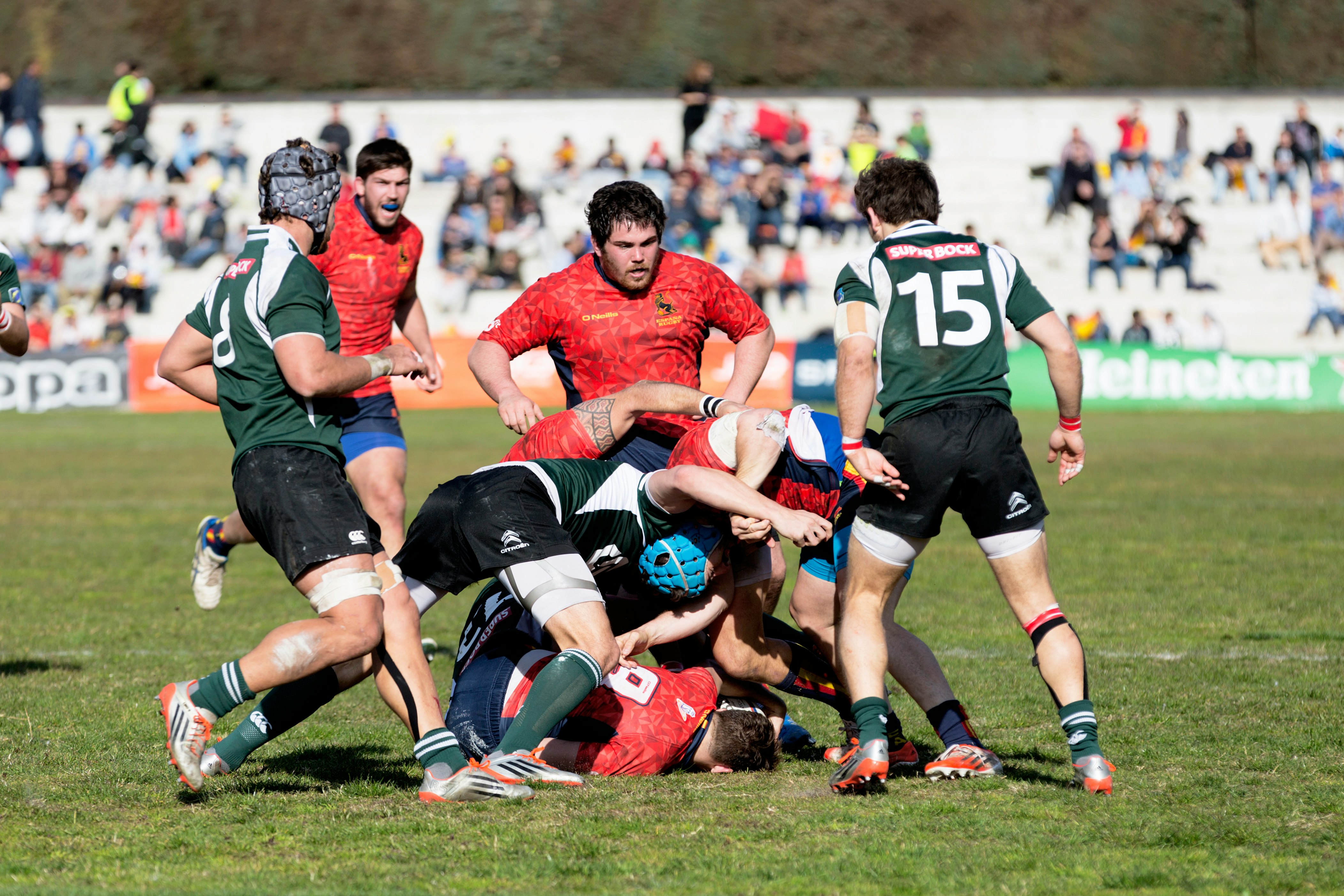 men playing rugby football